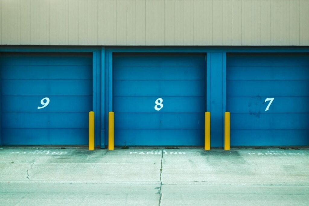 A self-storage unit with numbered doors.